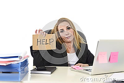 40s businesswoman holding help sign working desparate suffering Stock Photo