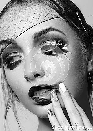 20s Dramatic Fashion Look Woman. Beautiful Model with Retro Make-up. Halloween Style. Cinematic Black and White Stock Photo