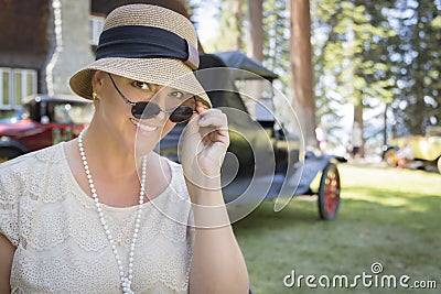 1920s Dressed Girl Near Vintage Car Outdoors Portrait Stock Photo