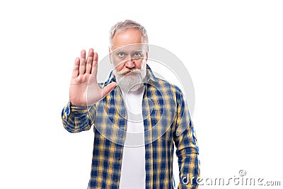 50s elderly gray-haired man with beard greets showing palm on white background Stock Photo