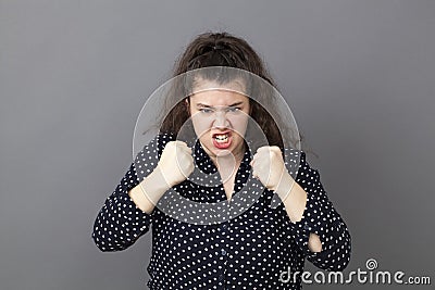 20s fat woman showing childish anger and tantrum Stock Photo