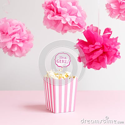 It`s a girl sign in a popcorn bag at the baby shower party. Bab Stock Photo