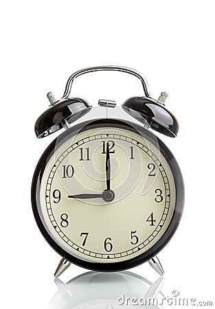 It`s nine o`clock already, time to wake up for breakfast, vintage old black metallic alarm clock Stock Photo