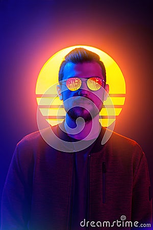 Retro wave synth vapor wave portrait of a young man in sunglasses Stock Photo