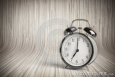 It`s seven o`clock already, time to wake up for breakfast, vintage old black metallic alarm clock Stock Photo