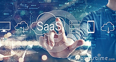 SaaS - software as a service concept with a man on city background Stock Photo