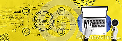 SaaS - software as a service concept with person using a laptop Stock Photo