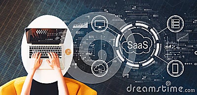 SaaS - software as a service concept with person using a laptop Stock Photo