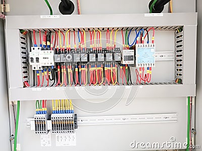 Selective focus image with noise effect a row various type of electrical relays. Editorial Stock Photo