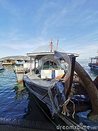 Outdoor scenery during day time with fisherman boats and ships near Todak Waterfront.Selective focus. Editorial Stock Photo