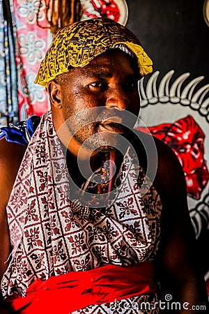 African Male Traditional Healer known as a Sangoma or witch-doctor performing a spiritual reading Editorial Stock Photo