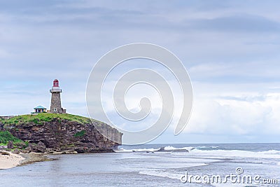 Sabtang Lighthouse fronting the shore at Batanes, Philippines Stock Photo