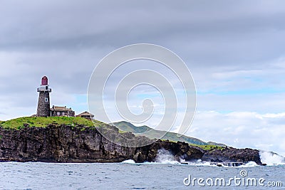 Sabtang Lighthouse fronting the shore at Batanes, Philippines Stock Photo