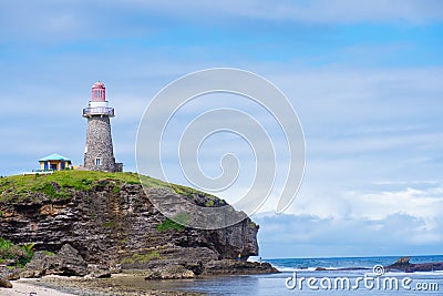 Sabtang Lighthouse fronting the shore at Batanes, Philippines Stock Photo