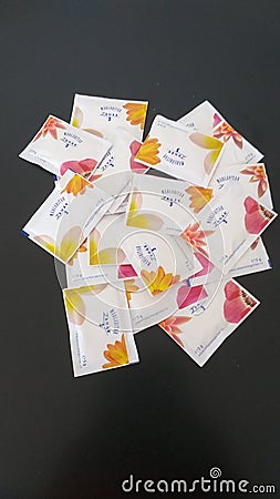 Sachets of caster sugar to sweeten coffee or tea! Stock Photo