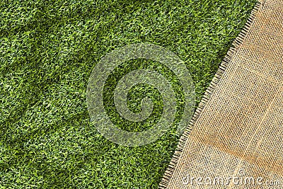 Sack fabric on grass background - Text space Stock Photo