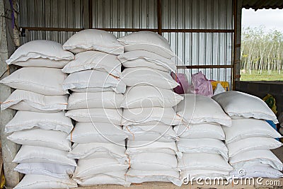 Sack food in warehouse at farm pig. Stock Photo