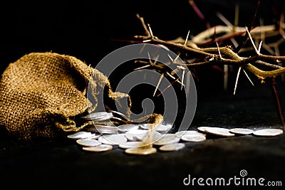 Sack with the thirty silver coins biblical symbol of the betrayal of judas Stock Photo