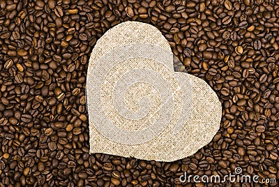 Sackcloth heart on coffee beans Stock Photo