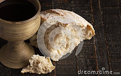 Sacrament of Holy Communion on a Dark Wooden Table Stock Photo