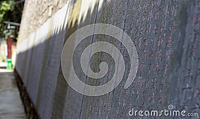 Sacred Alignment: Ancient Stone Tablets Bearing Buddhist Wisdom Stock Photo