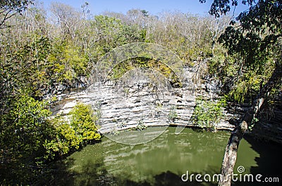 Sacred Cenote at archaeological zone of ChichÃ©n ItzÃ¡ Stock Photo