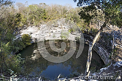 Sacred cenote at Chichen Itza Stock Photo