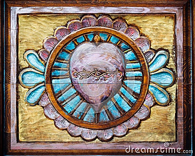 Sacred Heart Carved on Wood Stock Photo