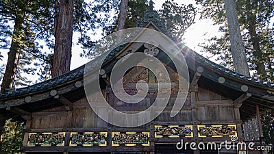 Shinkyusha-Sacred Stable-and Sanzaru-Three Wise Monkeys at Toshogu Shrine Stock Photo