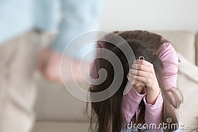 Sad abandoned wife with wedding ring, husband leaving, getting d Stock Photo