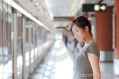 A sad asian woman Stock Photo