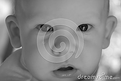 Sad Baby with Tear Stock Photo