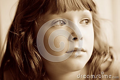 Sad, bored, daydreaming child Stock Photo