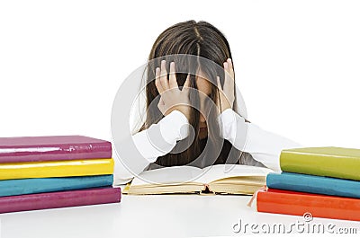 Sad or bored little student girl studying looking frustrated with learning problems. Stock Photo