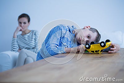 Sad boy sick of autism Stock Photo