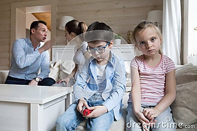 Sad children listen parents have angry fight at home headshot Stock Photo