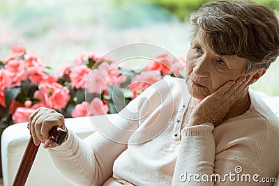 Elder lady worrying Stock Photo