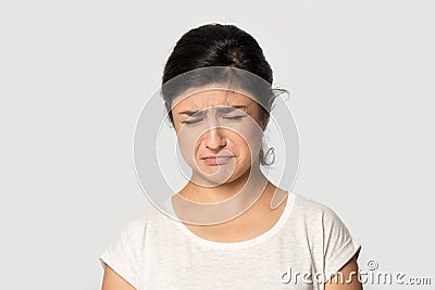 Sad ethnic girl crying suffering from depression Stock Photo