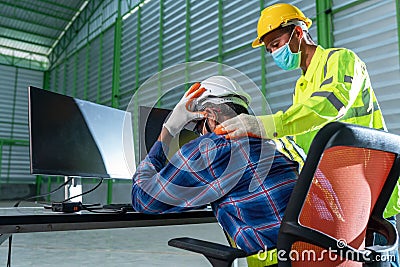 The sad feeling of engineering in the warehouse and worker Stock Photo