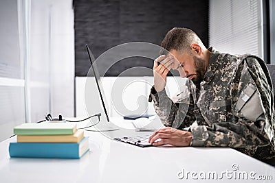 Sad Frustrated Military Veteran Student Doing Test Stock Photo