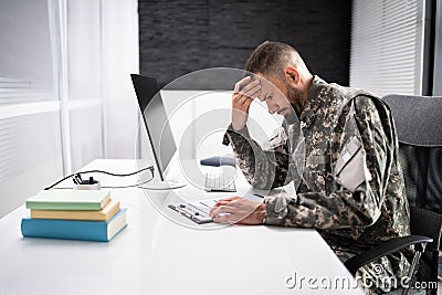 Sad Frustrated Military Veteran Student Doing Test Stock Photo