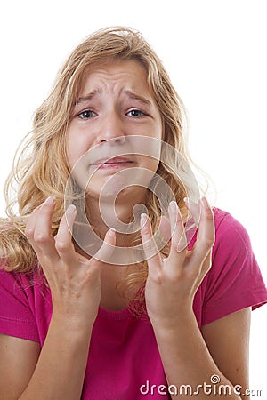 Sad girl in despair over white background Stock Photo