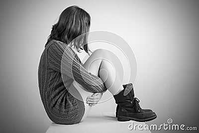 Sad girl in a sweater Stock Photo