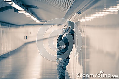 Depressed young man looking destroyed wasted and sad suffering f Stock Photo