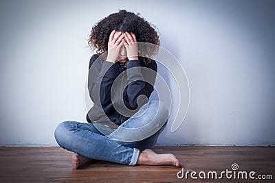 Sad and lonely black girl feeling alone Stock Photo