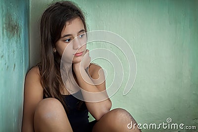 Sad and lonely hispanic girl Stock Photo