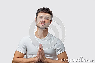 Sad man praing to the God. ask foregiveness and help Stock Photo