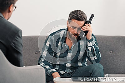 Sad man with psychologist theraphy social problems concept alcohol addiction. Social worker counseling parental. Stock Photo