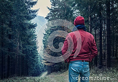 Sad man walking by forest Stock Photo