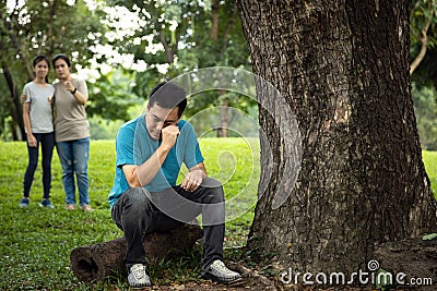 Sad man was sit, cry and tired about work or business,depressed asian male people rub his eye while cry feel disappointed with job Stock Photo